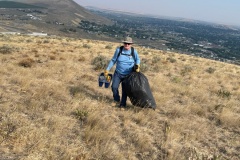 Ken Knudson weeding July 28